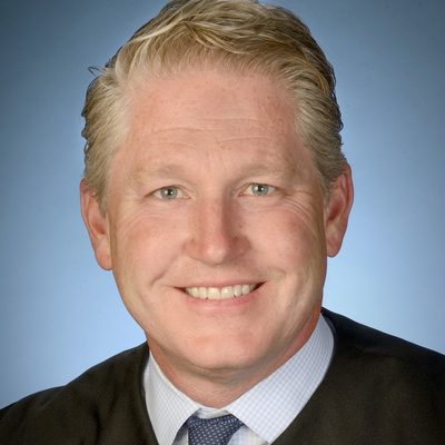 United States District Court for the District of Columbia · Public domain · via Wikimedia Commons Portrait of Carl John Nichols